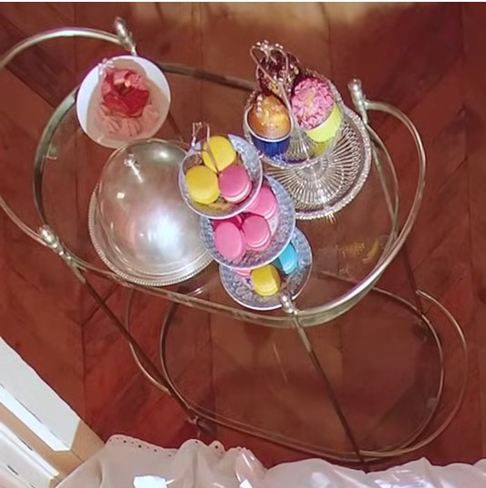 A cart with desserts.